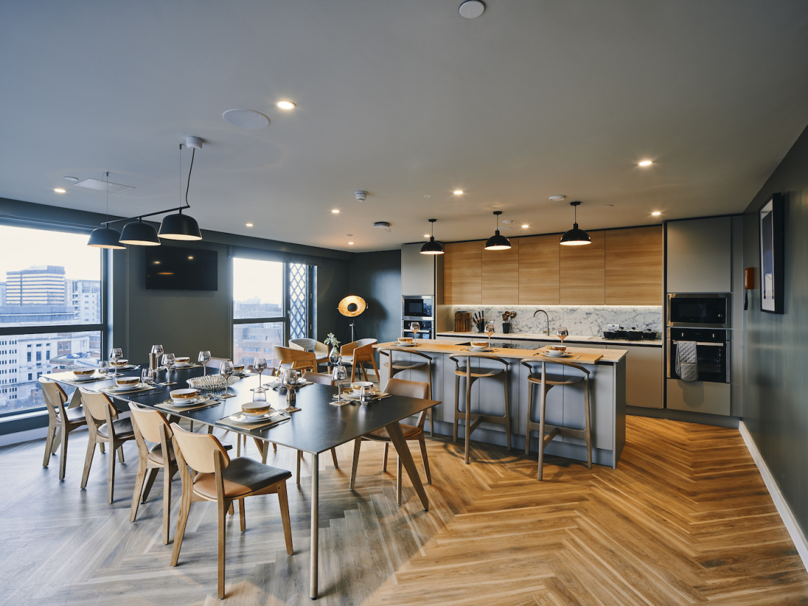 Symons House, Leeds - The private dining space includes built-in kitchen and island by Gemini. Photography by Gu Shi Yin