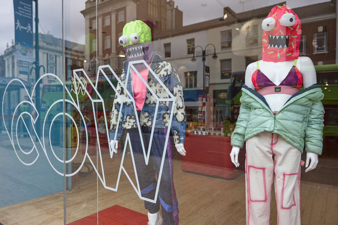 Stylish vintage mannequins showcase colorful outfits in COW's new flagship store in Leeds.