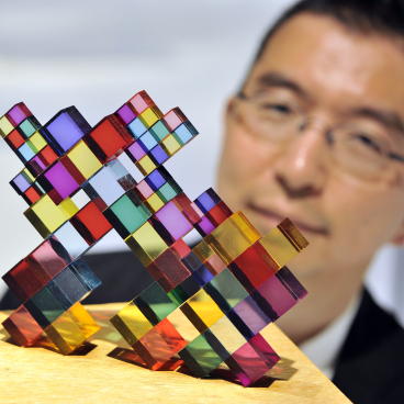 Sou Fujimoto, acclaimed Japanese architect, inspects Stacked Colours, one of 100 exhibits on display in his exhibition Futures of the Future at Japan House London