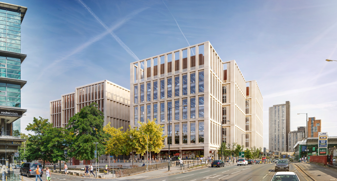 Modern Manchester Digital Campus office complex designed by AtkinsRéalis, featuring green spaces and urban architecture.