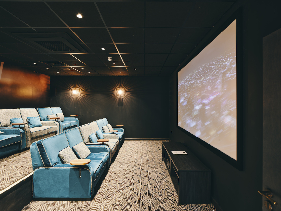 Symons House, Leeds - Ultra-luxe seating within the cinema room. Photography by Gu Shi Yin