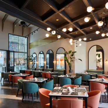 Stylish interior of Third Avenue Boutique restaurant featuring elegant seating and luxurious decor in Dubai Mall.