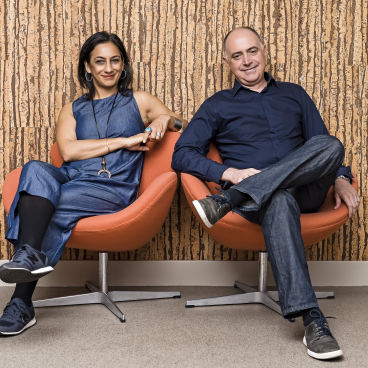 Gurvinder Khurana and Nigel Tresise of align seated in modern chairs, embodying their innovative approach to interior design.