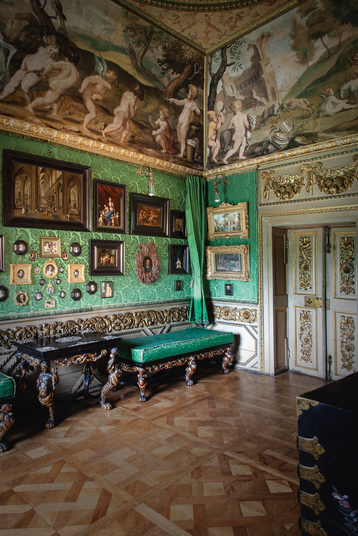 Ham House. The Green Closet. The decoration and contents of this room are original although the green silk damask has been copied recently. It is a rare example of the high culture, in both the fine and decorative arts, of the English court before the Commonwealth. Courtesy © Derry Moore | Prestel