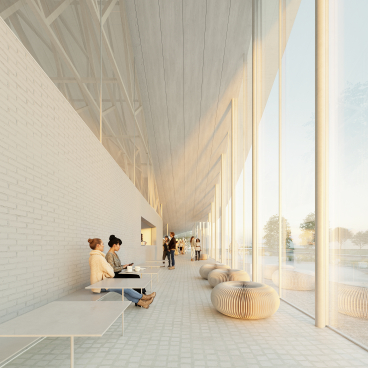 Brightly lit interior of the new Museum for Paper Art, featuring modern seating and large windows showcasing a scenic view.